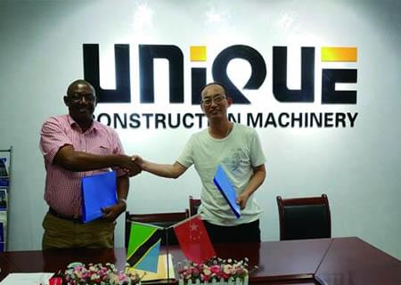 Sign sales contract of truck crane with Tanzanian client